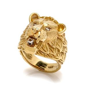 * A 14 Karat Yellow Gold and Diamond Lion Motif Ring, Maurice Katz, 13.30 dwts.