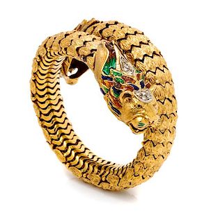 * An 18 Karat Yellow Gold, Diamond and Polychrome Enamel Lion Motif Flexible Cuff Bracelet, 69.75 dwts.