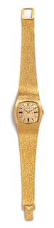 * A 14 Karat Yellow Gold Wristwatch, Rolex, 32.80 dwts.