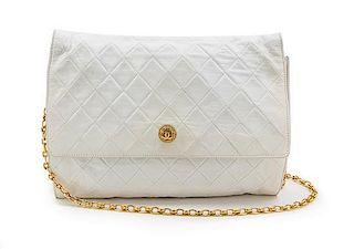 * A Chanel White Quilted Leather Flap Bag, 11 1/2 x 9 x 1 1/2 inches.