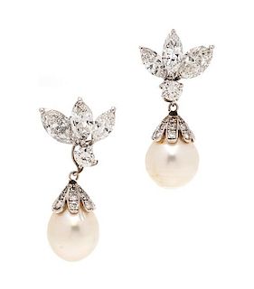 * A Pair of Platinum, White Gold, Diamond and Cultured Baroque South Sea Pearl Convertible Earclips, 9.50 dwts.
