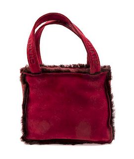 * A Chanel Bordeaux Suede and Shearling Tote Bag, 9 x 8 x 3 inches.