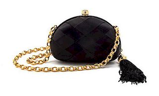 * A Chanel Black Satin Basketweave Convertible Evening Bag, 6 x 4 x 2 inches.