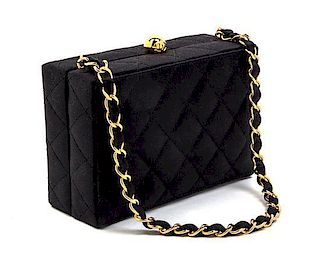 * A Chanel Black Satin Quilted Box Bag, 6 1/2 x 4 1/2 x 2 1/2 inches.