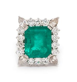* A Platinum, Emerald and Diamond Ring, 13.45 dwts.
