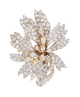 A Platinum, Yellow Gold and Diamond Flower Pendant/Brooch, 14.55 dwts.