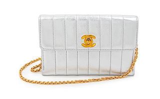 * A Chanel Silver Quilted Leather Mini Flap Shoulder Bag, 6 1/2 x 4 x 2 inches.