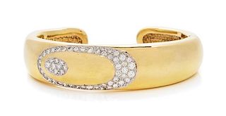 A 14 Karat Yellow Gold and Diamond Cuff Bracelet, 27.00 dwts.