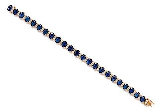 A Yellow Gold, Sapphire and Diamond Bracelet, 13.50 dwts.