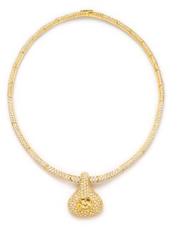 An 18 Karat Yellow Gold, Yellow Sapphire and Diamond Pendant/Necklace, 40.50 dwts.