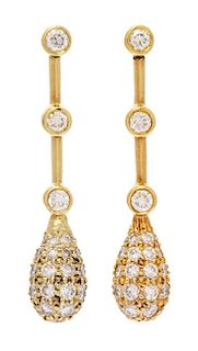 A Pair of 18 Karat Yellow Gold and Diamond Earrings, 4.20 dwts.