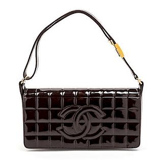 A Chanel Brown Quilted Patent Leather Bag. 9 1/2 x 4 1/2 x 2 inches.