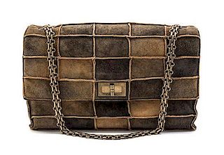 * A Chanel Brown Suede Patchwork Flap Bag, 10 x 6 x 2 1/2 inches.