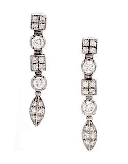 A Pair of 18 Karat White Gold and Diamond 'Lucea' Earclips, Bvlgari, 6.55 dwts.