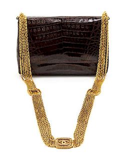* A Chanel Brown Exotic Skin Leather Bag, 8 x 5 x 3 inches.