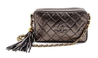 A Chanel Metallic Grey Quilted Leather Bag, 8 1/2 x 5 x 2 1/2 inches.