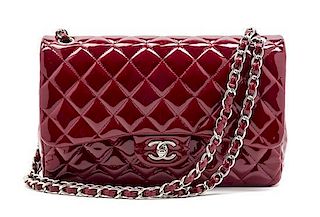 A Chanel Red Patent Leather Jumbo Double Flap Bag, 12 x 8 x 3 1/2 inches.