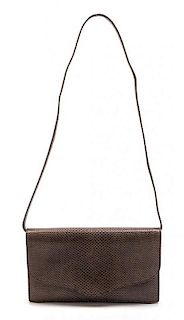 * An Hermes Taupe Lizardskin Convertible Clutch, 8 1/2 x 5 x 1 inches.