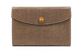 * An Hermes Taupe Lizardskin Rio Clutch, 9 1/2 x 6 1/2 x 1 inches.