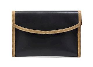 * An Hermes Graphite and Taupe Leather Clutch, 9 1/2 x 6 1/2 x 1 inches.