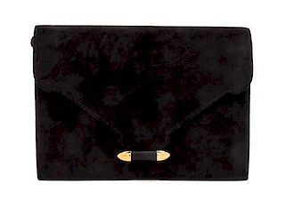 * An Hermes Black Suede Clutch, 8 1/2 x 6 x 1 inches.