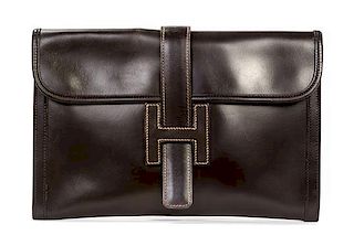 An Hermes Brown Leather Jige PM Clutch, 11 1/4 x 7 1/2 x 1/4 inches.