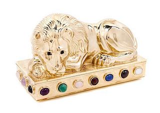 A Judith Leiber Goldtone Lion Minaudiere, 5 1/2 x 3 x 2 1/2 inches.