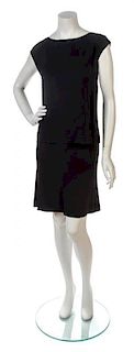 * A Chanel Black Silk Skirt Ensemble, Shell size 46, skirt size 46.