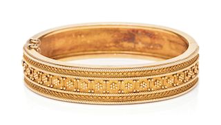 An Etruscan Revival Yellow Gold Bangle Bracelet, 14.00 dwts.