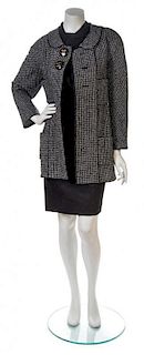 * A Chanel Black and Grey Boucle Jacket,