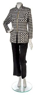 * A Chanel Black and White Wool Houndstooth Jacket, Jacket size 42, pants size 38.