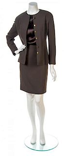 * A Chanel Olive Green Ribbed Wool Skirt Suit,