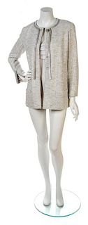 * A Chanel Silver Glitter Tweed Jacket, Jacket size 40, top size 40.