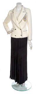 * A Chanel Ivory Wool Crepe Crest Jacket,