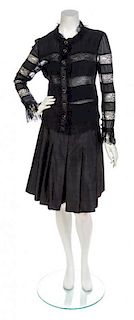 * A Group of Chanel Black Silk Separates,