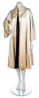 A Jacques Fath Oyster Silk Satin Opera Coat,