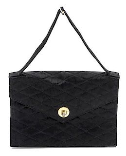 * A Chanel Black Satin Quilted Evening Bag, 8 1/2 x 6 x 1 inches.