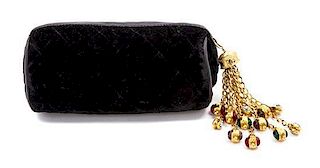 * A Chanel Black Quilted Velvet Clutch, 6 1/2 x 3 x 3 inches.