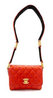 * A Chanel Red Quilted Leather Mini Flap Bag, 5 x 4 x 2 inches.