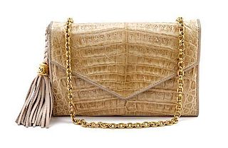 * A Chanel Ivory Exotic Skin Convertible Flap Bag, 7 x 5 x 1 1/2 inches.