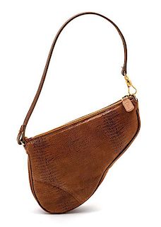 * A Christian Dior Bronze Embossed Saddle Mini Bag, 8 x 6 x 1 1/2 inches.