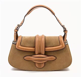 * A Christian Dior Tan Suede and Leather Bag, 11 x 4 1/2 x 3 inches.