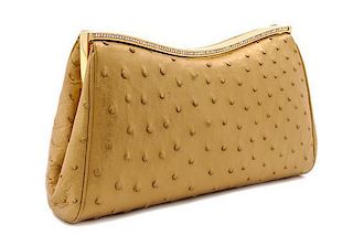 * A Judith Leiber Metallic Gold Ostrich Evening Bag, 9 1/2 x 5 x 1 1/2 inches.