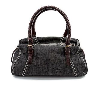 * A Miu Miu Denim and Brown Leather Bag, 13 x 6 1/2 x 6 inches.