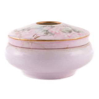 A porcelain powder bowl.