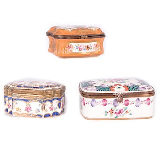 Three 19th century enameled porcelain boxes.