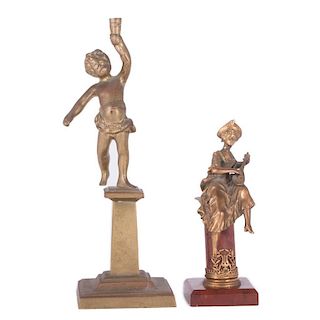 Two Metal Figures on Pedestals.
