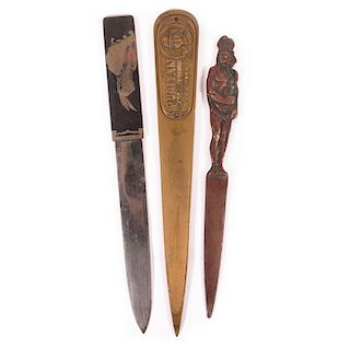 Three metal letter openers with Indian themes.