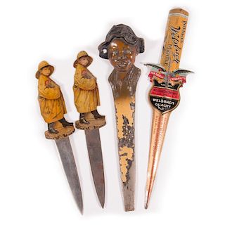 Lot of three transfer letter openers and a blackamoor cast child.