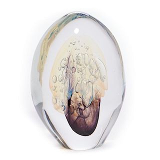 A large blown glass paperweight.